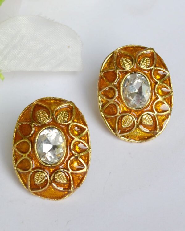 golden earrings with white pearl